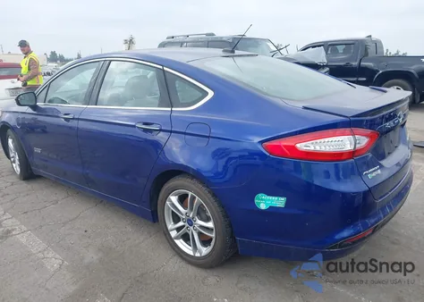 2015 Ford Fusion Energi Titanium from USA, damaged, VIN 3FA6P0SU2FR128700